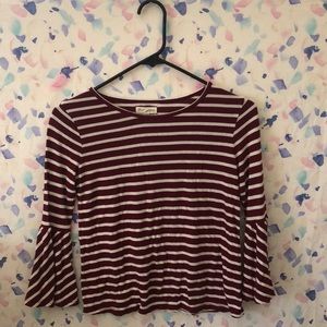 Red and white striped shirt.